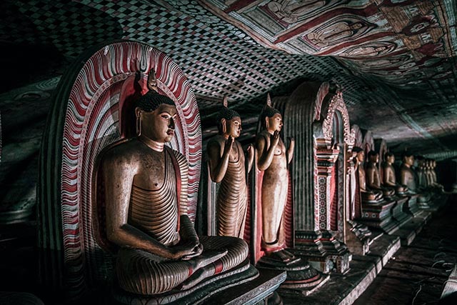 Buddha statues inside Dambulla cave, Sri Lanka